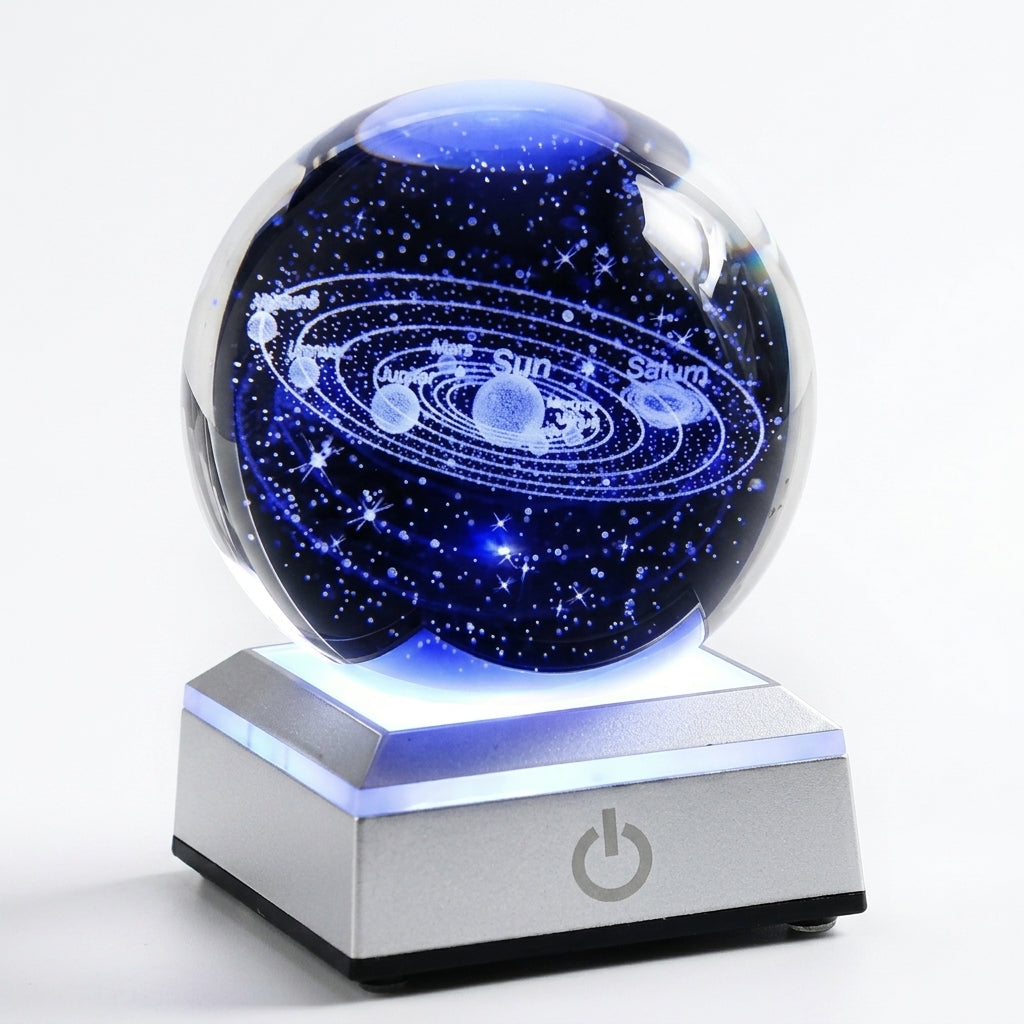 3D solar system crystal ball glowing on its colour-changing LED base.