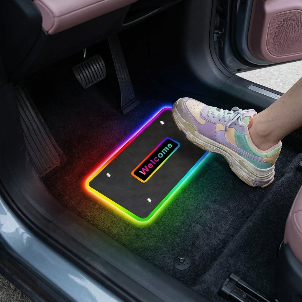 All weather floor mats installed in a car footwell with glowing RGB LED ambient lighting.