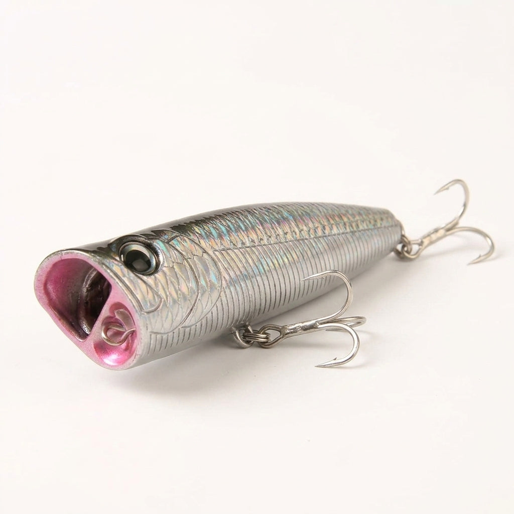 Close-up of the best bass fishing lures showing the deep cupped mouth, treble hooks, and lifelike scale finish that fools predatory fish.