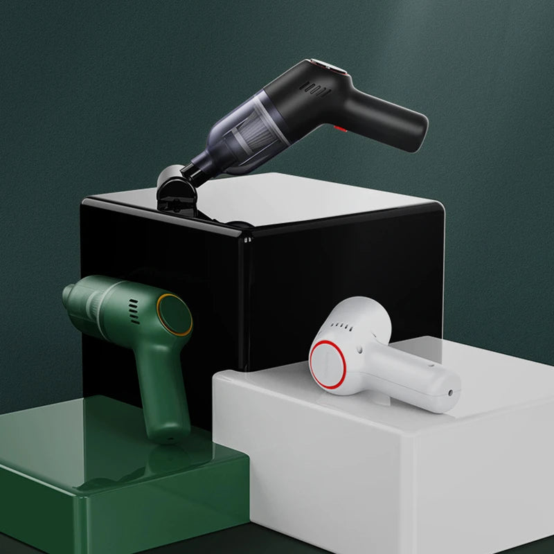 Cordless car hoover in green shown on a dark background, highlighting the slim ergonomic body and suction nozzle.