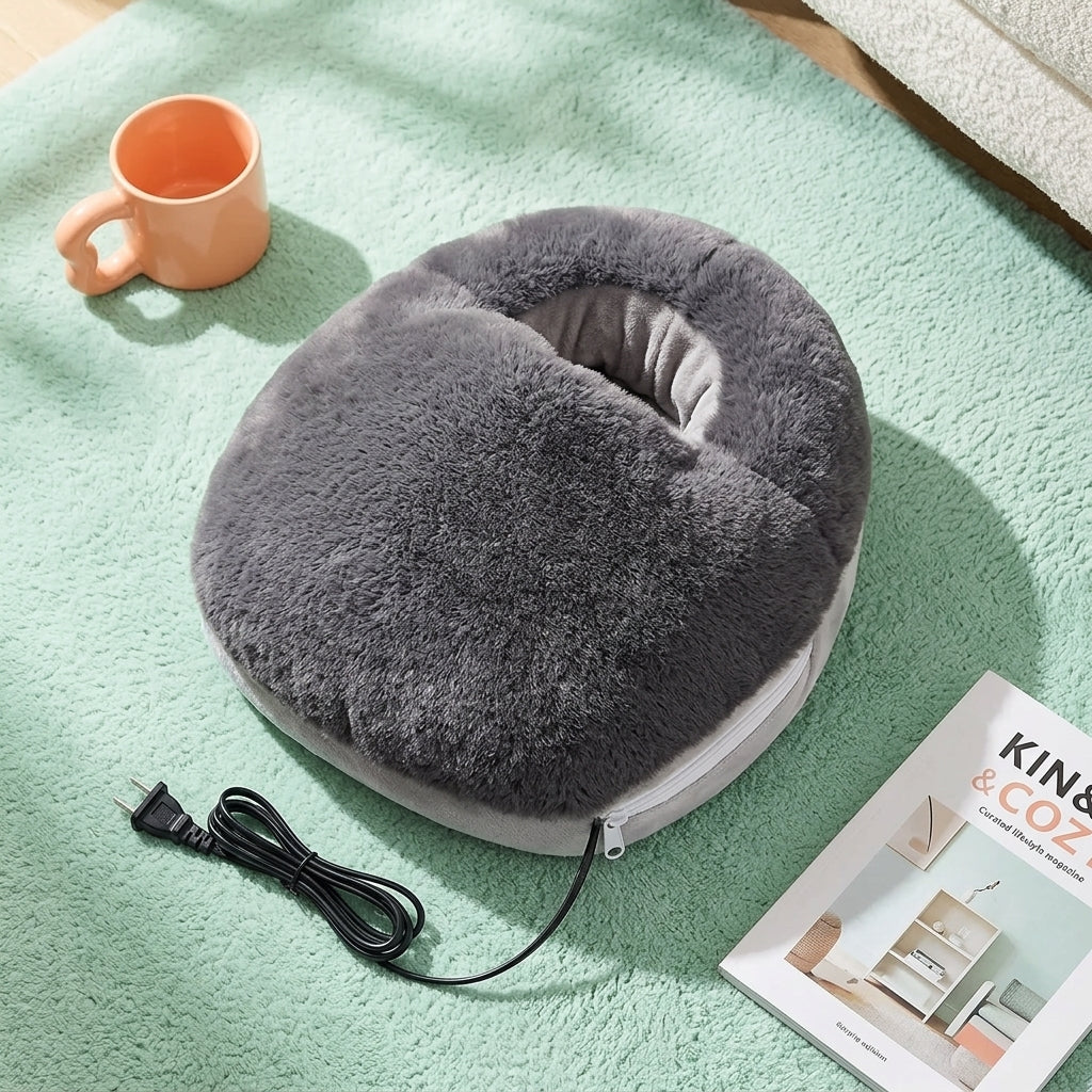 Heated foot warmer placed on a desk next to a coffee mug, showing how it keeps feet warm during long work-from-home sessions.