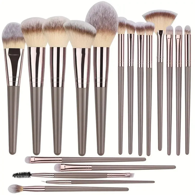 18-piece professional makeup brushes set flat lay showing the complete range including concealer brush, fan brush, and full eye brush collection.